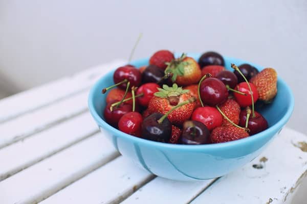 bowl of cherries and strawberries